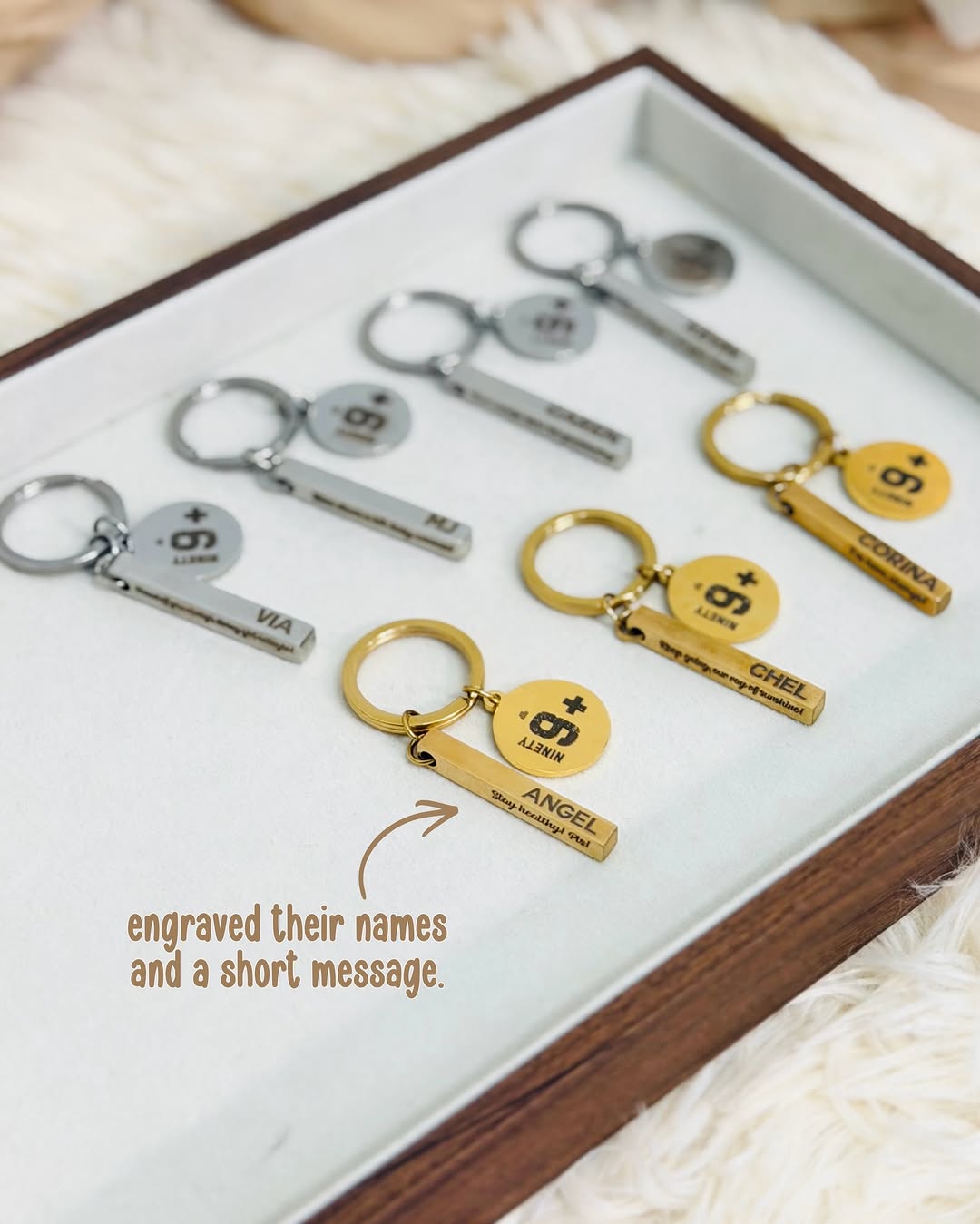 Close-up of custom keychains with personalized charm engravings for a friend group