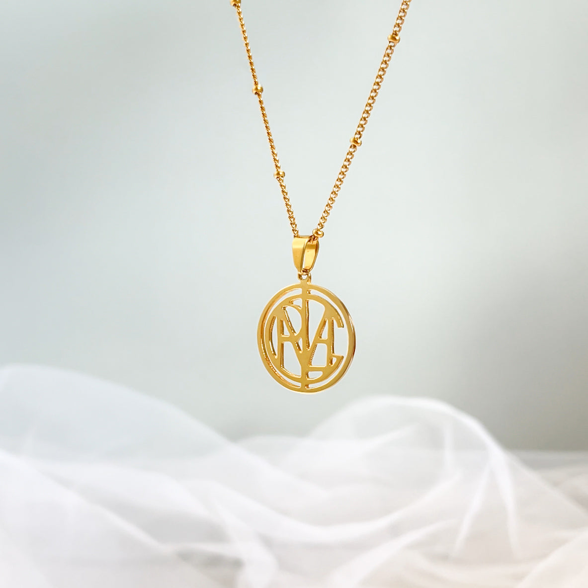 Gold monogram necklace with initial letter pendant